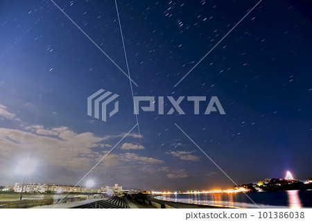 The International Space Station shining over the Enoshima coast as it passes by The International Space Station shining over the Enoshima coast as it passes by 101386038