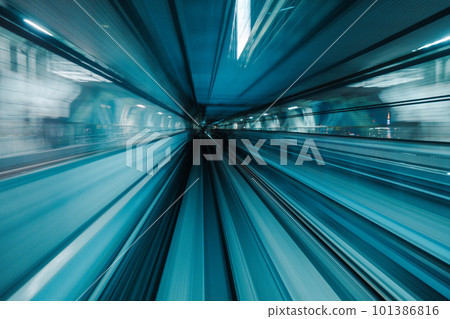 Motion blurred of train moving inside tunnel with 101386816