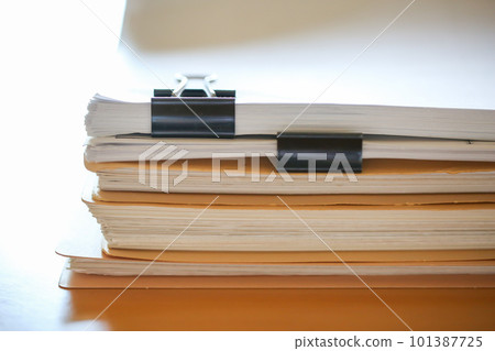 Documents stacked on the desk Paper documents Documents stacked on the desk Paper documents 101387725