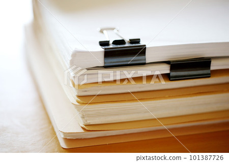 Documents stacked on the desk Paper documents Documents stacked on the desk Paper documents 101387726