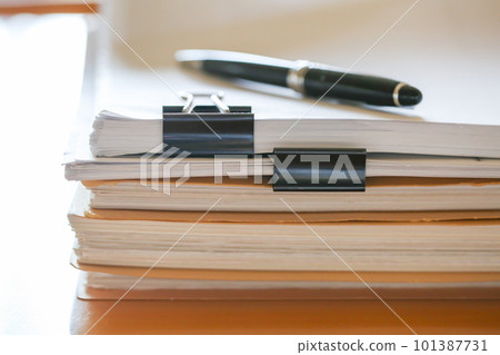 Documents stacked on the desk Paper documents Documents stacked on the desk Paper documents 101387731