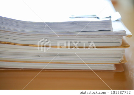 Documents stacked on the desk Paper documents Documents stacked on the desk Paper documents 101387732