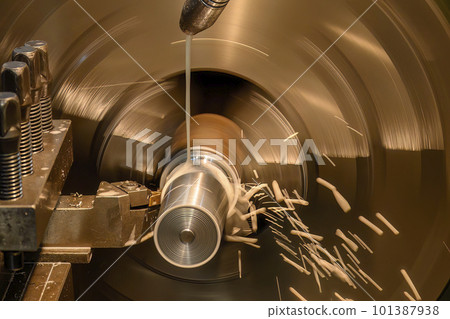 Close up scene the lathe machine finish cut metal shaft parts with liquid coolant method. Close up scene the lathe machine finish cut metal shaft parts with liquid coolant method. 101387938
