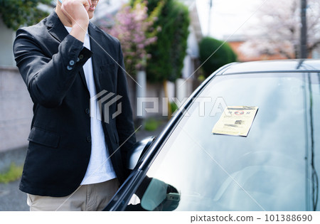 A car with a parking sticker A car with a parking sticker 101388690