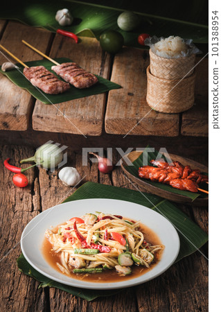 Spicy Papaya Salad with Fermented Fish, Thai Recipe 101388954