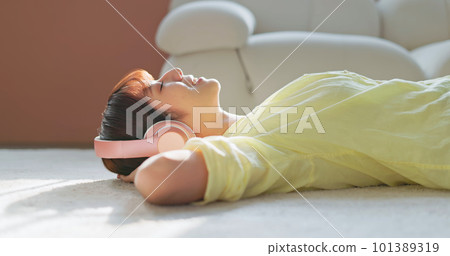 asian girl listen headset music 101389319