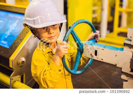 Boy operator recording operation of oil and gas process at oil and rig plant, offshore oil and gas industry, offshore oil and rig in the sea, operator monitor production process, routine daily record 101390892