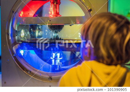 Smart boy scientist making physical experiments in the laboratory. Educational concept. Discovery 101390905