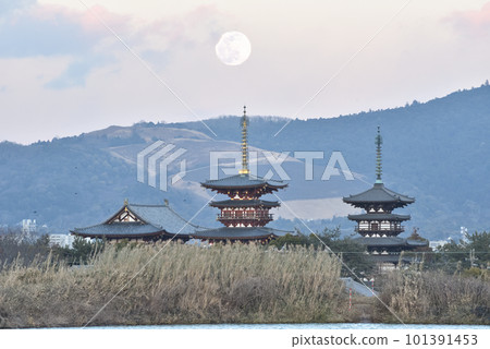Black Mt. Wakakusa after mountain burning, Yakushi-ji Temple at dusk, and moonscape 101391453