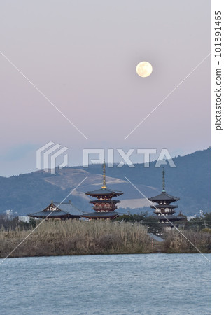 Black Mt. Wakakusa after mountain burning, Yakushi-ji Temple at dusk, and moonscape 101391465