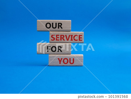 Our service for you symbol. Wooden blocks with words Our service for you. Beautiful blue background. Business and Our service for you concept. Copy space. 101391568