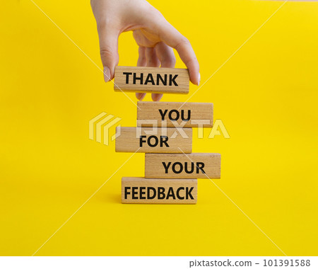 Feedback symbol. Wooden blocks with words Thank you for your Feedback. Beautiful yellow background. Businessman hand. Business and Thank you for your Feedback concept. Copy space. Feedback symbol. Wooden blocks with words Thank you for your Feedback. Beautiful yellow background. Businessman hand. Business and Thank you for your Feedback concept. Copy space. 101391588