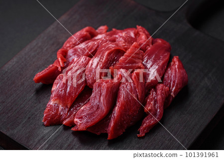 Fresh raw beef with salt, spices and herbs 101391961