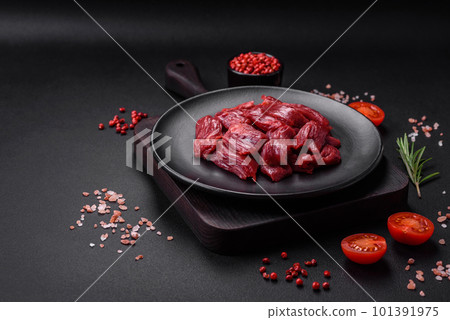 Fresh raw beef with salt, spices and herbs 101391975