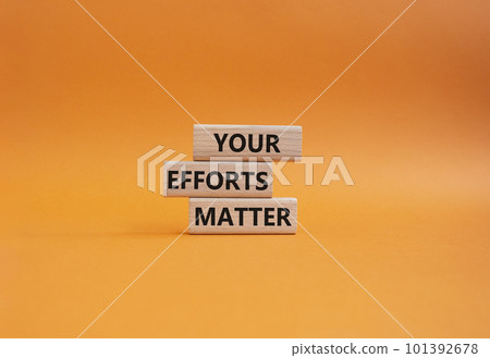 Your Effort Matter symbol. Wooden blocks with words Your Effort Matter. Beautiful orange background. Business and Your Effort Matter concept. Copy space. 101392678