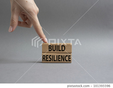 Build resilience symbol. Wooden blocks with words Build resilience. Beautiful grey background. Businessman hand. Business and Build resilience concept. Copy space. Build resilience symbol. Wooden blocks with words Build resilience. Beautiful grey background. Businessman hand. Business and Build resilience concept. Copy space. 101393396