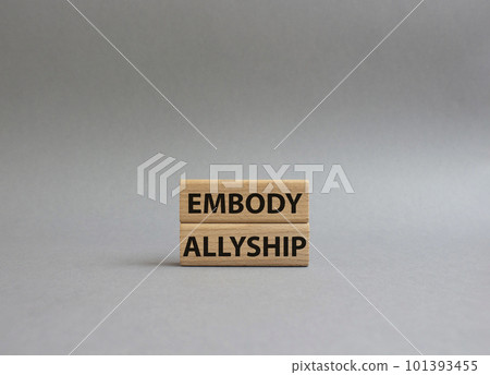 Embody Allyship symbol. Concept word Embody Allyship on wooden blocks. Beautiful grey background. Business and Embody Allyship concept. Copy space 101393455