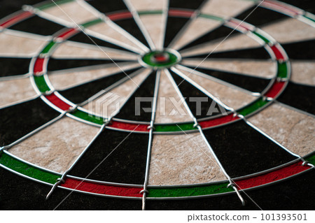 The new classic professional sisal dart target. Close-up, angle view. The new classic professional sisal dart target. Close-up, angle view. 101393501