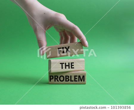 Fix the problem symbol. Wooden blocks with words Fix the problem. Beautiful green background. Businessman hand. Business and Fix the problem concept. Copy space. Fix the problem symbol. Wooden blocks with words Fix the problem. Beautiful green background. Businessman hand. Business and Fix the problem concept. Copy space. 101393856