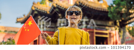 Enjoying vacation in China. Young boy with national chinese flag in Forbidden City. Travel to China with kids concept. Visa free transit 72 hours, 144 hours in China BANNER, LONG FORMAT 101394170