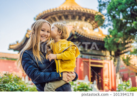Enjoying vacation in China. Mom and son in Forbidden City. Travel to China with kids concept. Visa free transit 72 hours, 144 hours in China Enjoying vacation in China. Mom and son in Forbidden City. Travel to China with kids concept. Visa free transit 72 hours, 144 hours in China 101394178