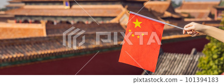 Enjoying vacation in China. Young woman with national chinese flag in Forbidden City. Travel to China concept. Visa free transit 72 hours, 144 hours in China BANNER, LONG FORMAT 101394183