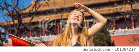 Enjoying vacation in China. Young woman with national chinese flag in Forbidden City. Travel to China concept. Visa free transit 72 hours, 144 hours in China BANNER, LONG FORMAT 101394217