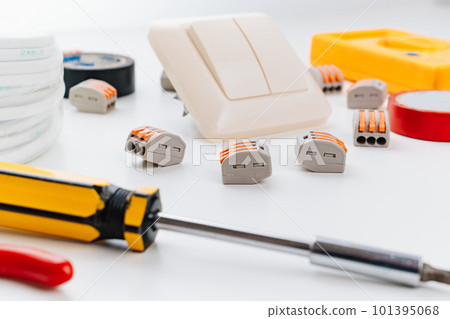 working tools for an electrician on a white background. working tools for an electrician on a white background. 101395068