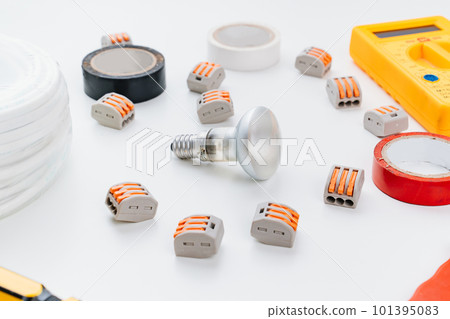 working tools for an electrician on a white background. working tools for an electrician on a white background. 101395083