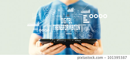 Digital Transformation concept with man using a tablet 101395387