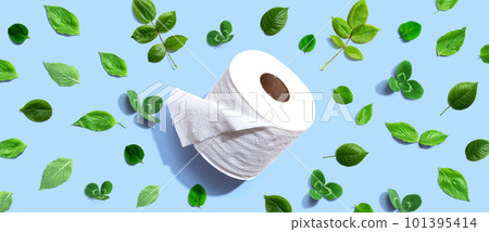 A roll of toilet paper with green leaves A roll of toilet paper with green leaves 101395414