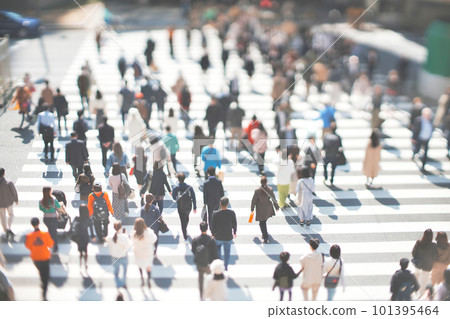 People crossing the pedestrian crossing Business image 101395464