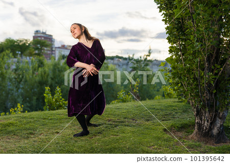 a hispanic ballerina beautiful dancer enjoy rhythm in motion with happy and cheerful movements 101395642