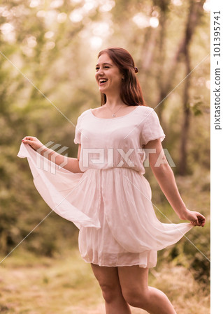 Young woman enjoy nature in autumn season. Lifestyle female portrait elegance retro fashion Young woman enjoy nature in autumn season. Lifestyle female portrait elegance retro fashion 101395741