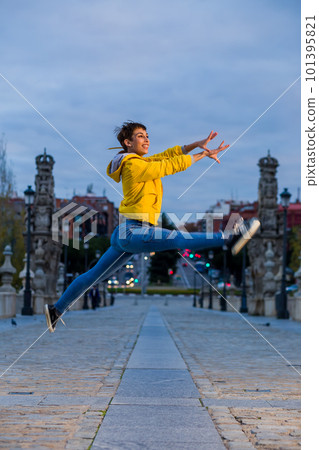 hispanic young female contemporany dancer joyful rhythm. Lifestyle energetic and fun dance. hispanic young female contemporany dancer joyful rhythm. Lifestyle energetic and fun dance. 101395821