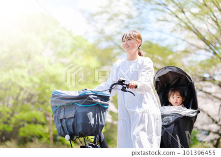 mother and girl riding a bicycle mother and girl riding a bicycle 101396455