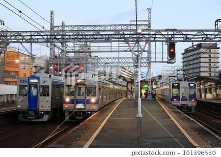 Nankai Shin-Imamiya station platform at dusk Nankai Shin-Imamiya station platform at dusk 101396530