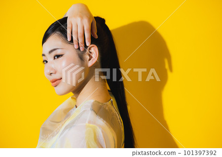 woman blowing her hair woman blowing her hair 101397392