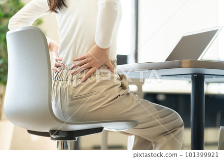Woman with lower back pain Woman with lower back pain Female, OL, career woman Woman with lower back pain Woman with lower back pain Female, OL, career woman 101399921