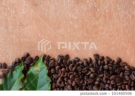 coffee beans on grunge wooden background coffee beans on grunge wooden background 101400506