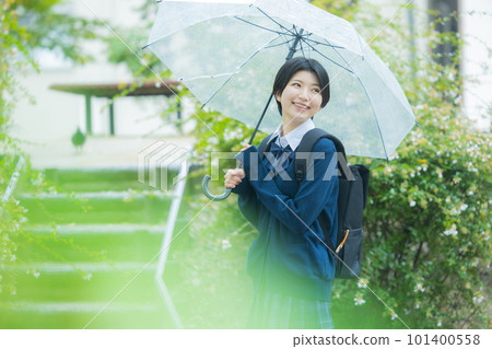 School girls with umbrella School girls with umbrella 101400558