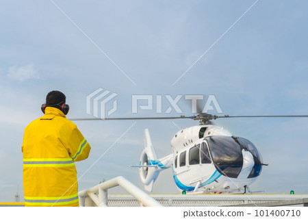 helicopter landing officer and alarm for the air rescue service. Team of rescuers medical helicopter 101400710