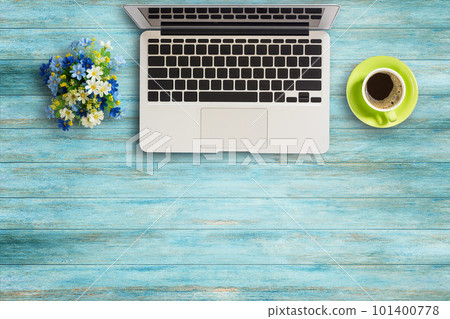 Office desk table with laptop computer on wooden table Office desk table with laptop computer on wooden table 101400778