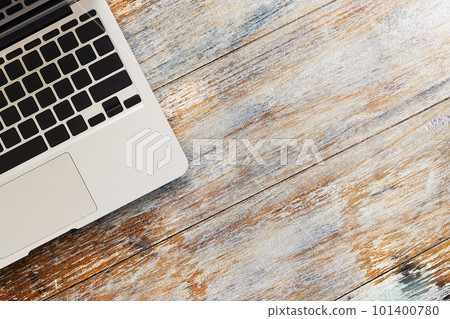 Laptop computer on wood table top view Laptop computer on wood table top view 101400780