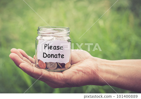 Hands holding money in the jar Hands holding money in the jar 101400889