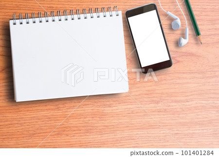 blank notebook and smart phone on wooden blank notebook and smart phone on wooden 101401284