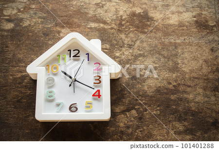 Alarm clock on wooden table Alarm clock on wooden table 101401288