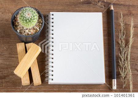 Pencil and notebook on wooden table background Pencil and notebook on wooden table background 101401361