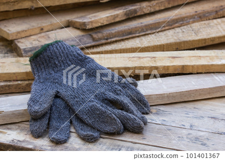 Gloves on wooden table Gloves on wooden table 101401367