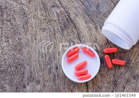 Closeup of medical capsule or pill Closeup of medical capsule or pill 101401549
